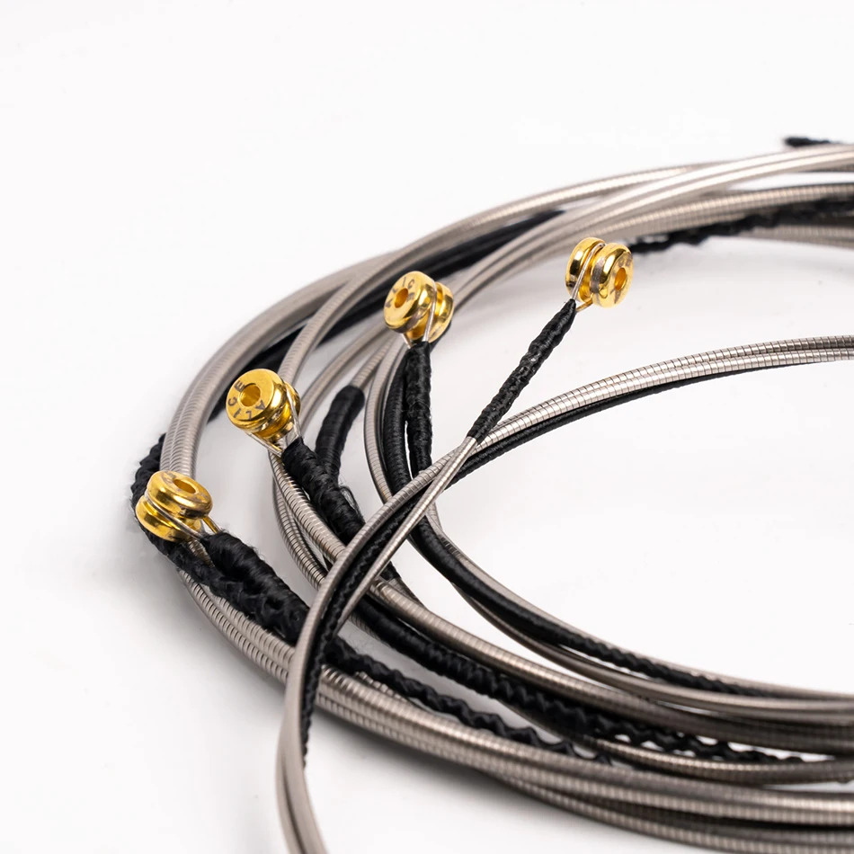 Alice A628 Fretless 4 corde per basso elettrico Set completo 4 corde con nucleo esagonale in lega di nichel avvolta con estremità a sfera dorata