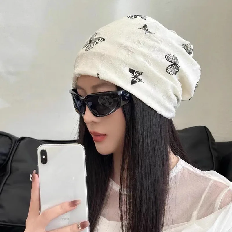 مترهل قبعة صغيرة المرأة 2025 الربيع قبعة على شكل جمجمة ثقب مصممة فراشة طباعة بونيه فام الشارع الشهير الهيب هوب Skullies & Beanies