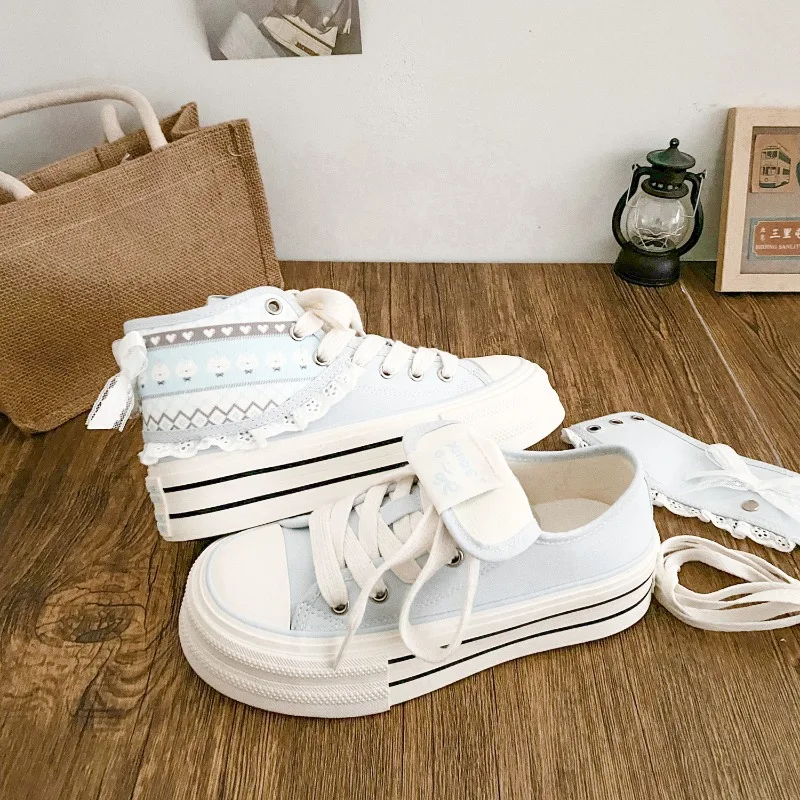 

2026 Women Canvas Shoes High Top Flanged Sneakers Female Canvas Short Boots Thick Sole Lace Up Students Black White Shoes