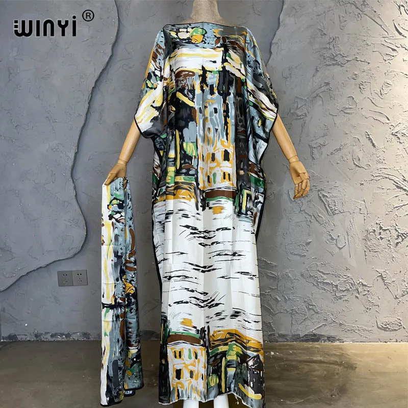 WINYI 2023 nowa afrykańska muzułmańska pani lato Boho nadrukowane Graffiti Kaftan sukienka na wakacje luźna kuwejt moda Streetwear Abaya