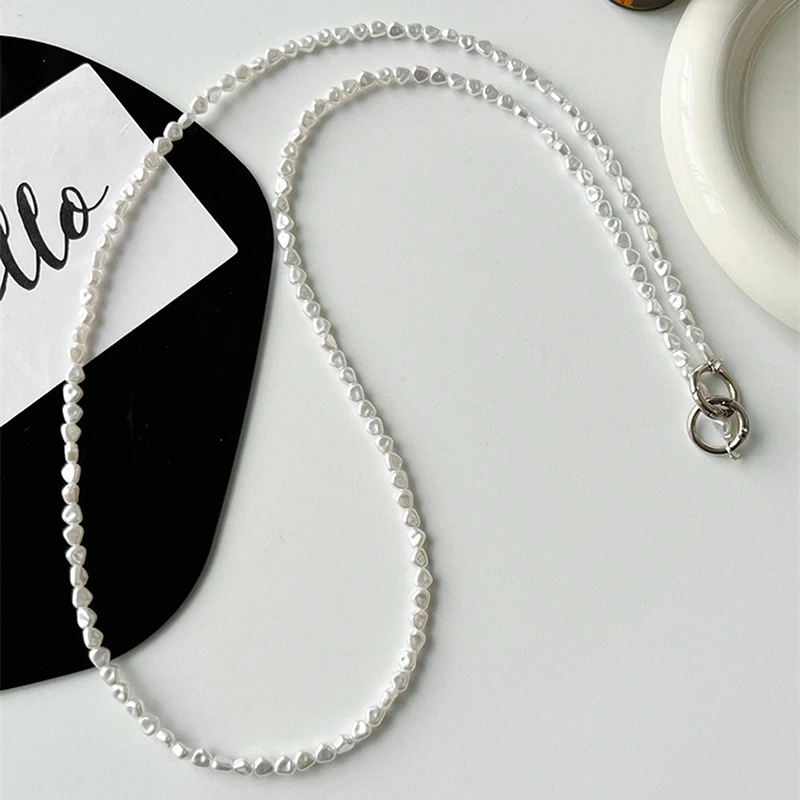 

Ремешок для мобильного телефона 120 см, женская цепочка через плечо на запястье с бисером, белая плоская жемчужная цепочка с защитой от потери, ремешок с зажимом для телефона