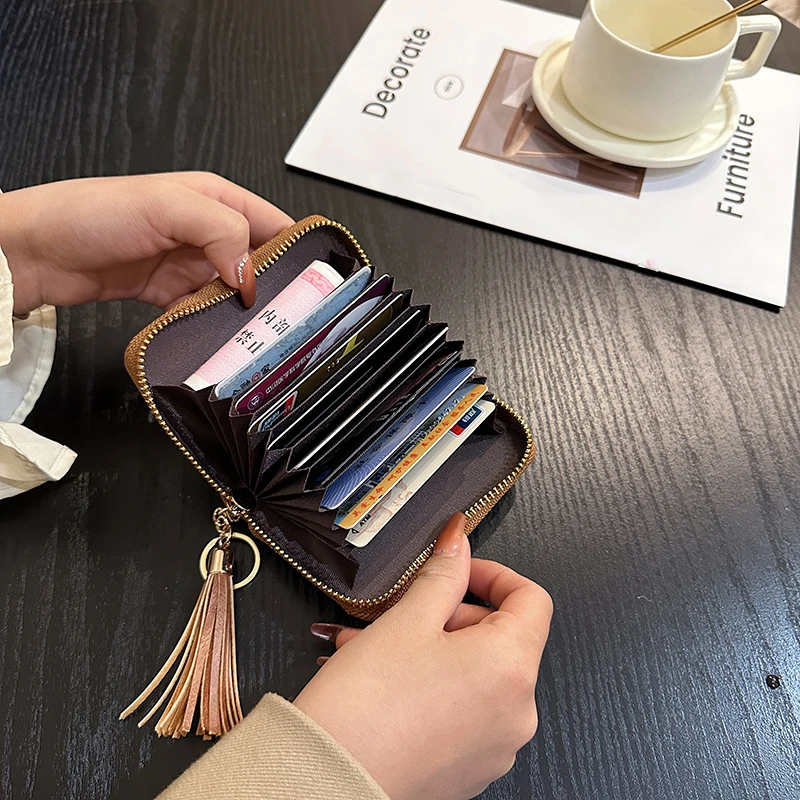 Porte-cartes décoratif Fringe pour femme, nouveau portefeuille design creux en PU, 2023