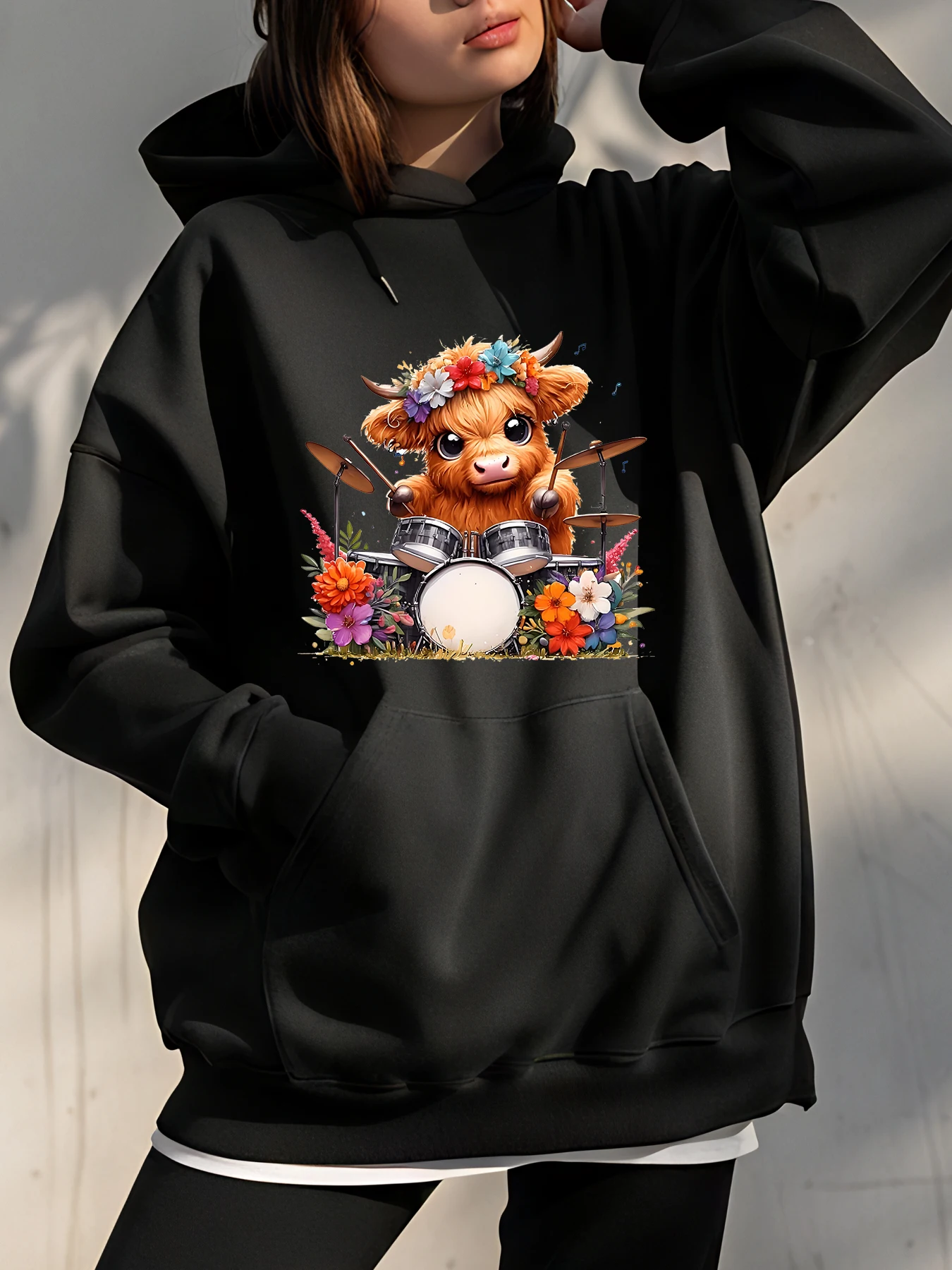 Floral Cow Drummer Hoodie With Vibrant Garden Design For Music Lovers And Nature Enthusiasts