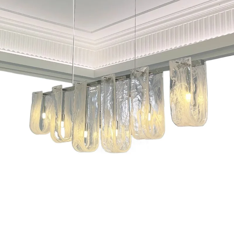 

French light luxury restaurant, chandelier designer Italian minimalism, cloud glass bar island, one-word long art lamp