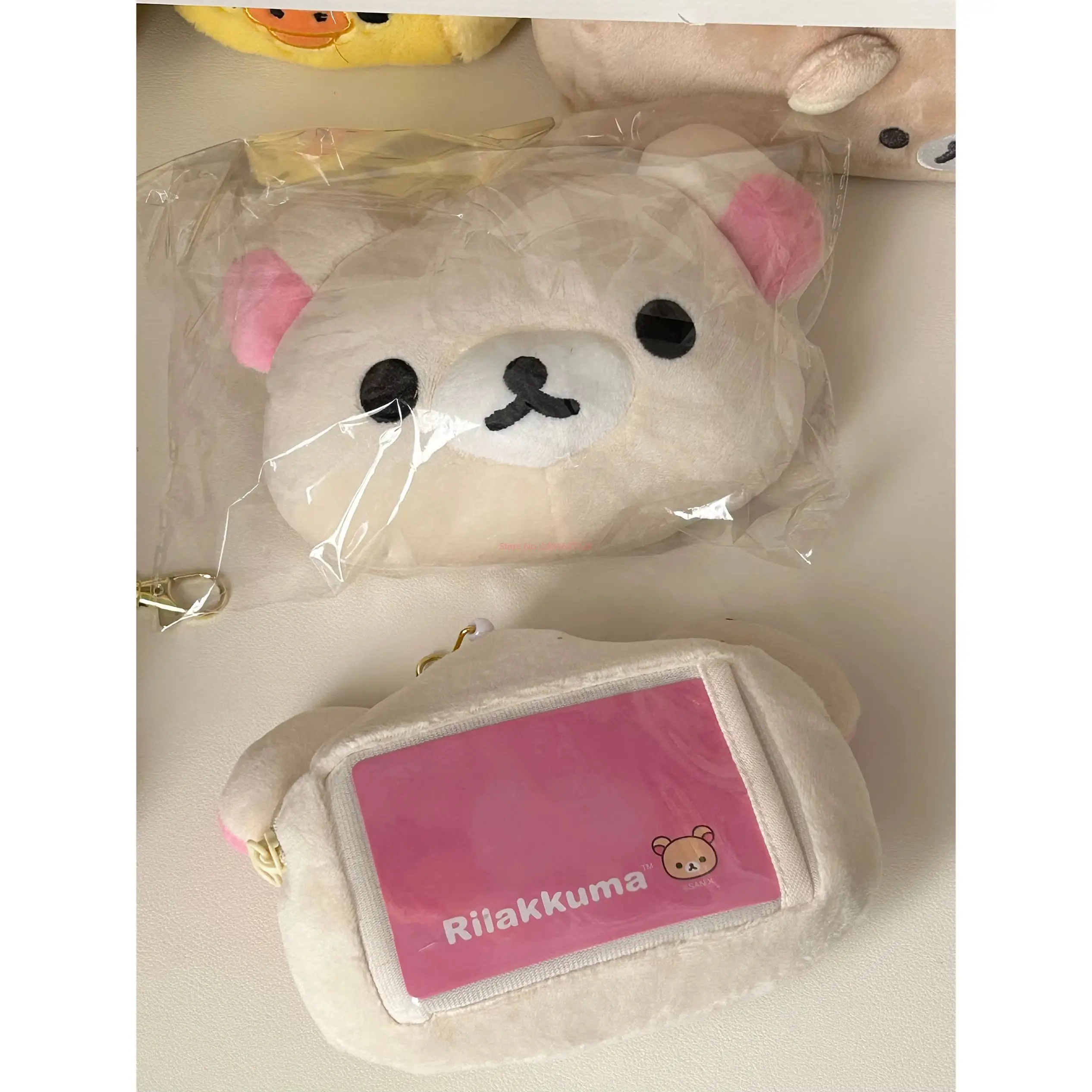 Kawaii rilakkuma mini saco de armazenamento de pelúcia cartão caneta borracha saco de armazenamento para crianças zero carteira mochila pingente saco papelaria escolar