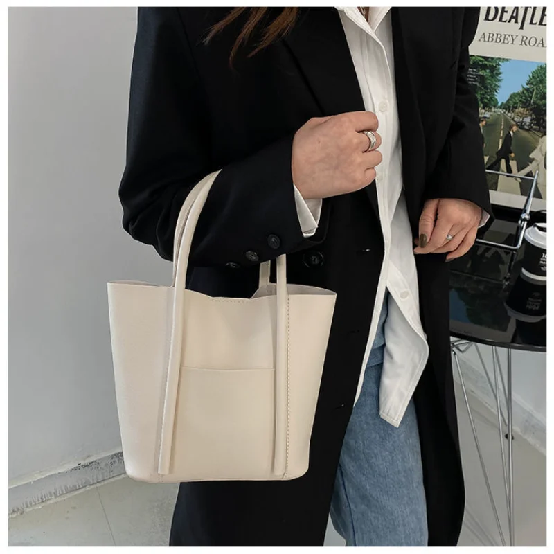 Bolso de hombro con textura de PU de gran capacidad, diseño Simple, tendencia de moda para mujer, combina con todo