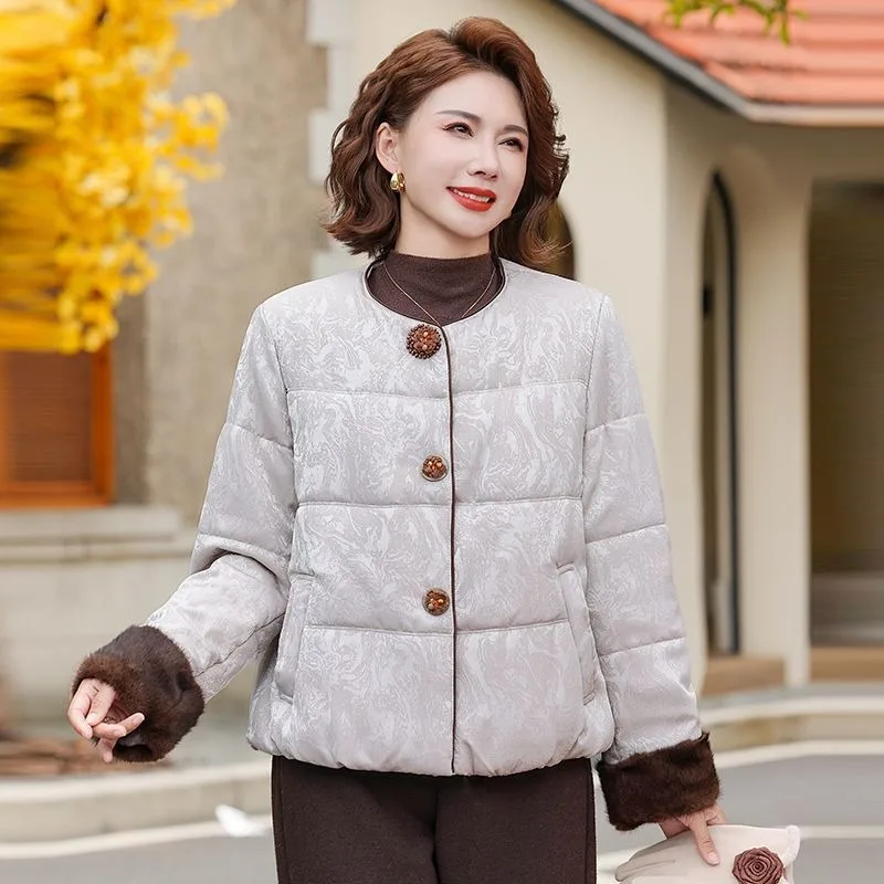 Chinese-style cotton-padded jacket for women's winter, new jacquard high-end. warm short cotton-padded jacket with patchwork.