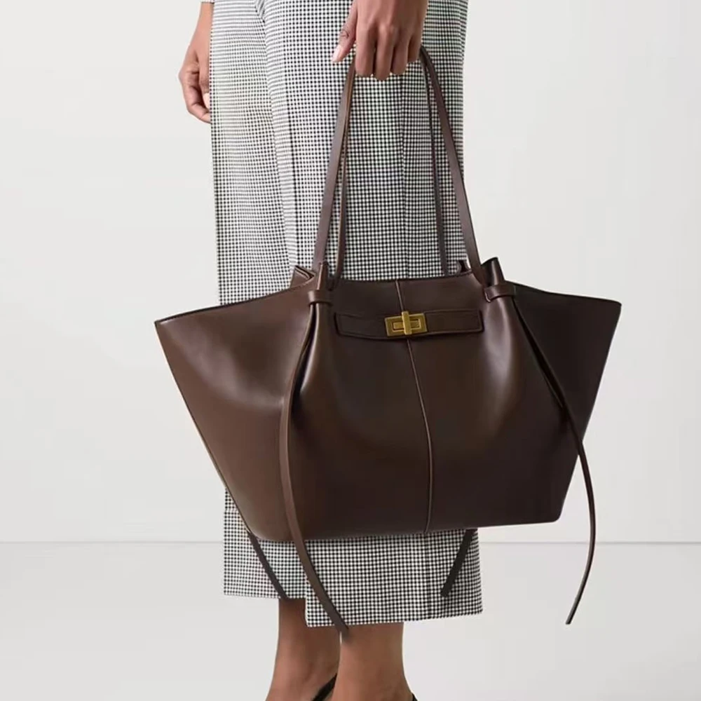 2026 French Wing Tote Bag Faux Leather Luxury Vintage European Trapeze Shoulder Bags Knotted Ties Daily Ladies Shopper Handbag