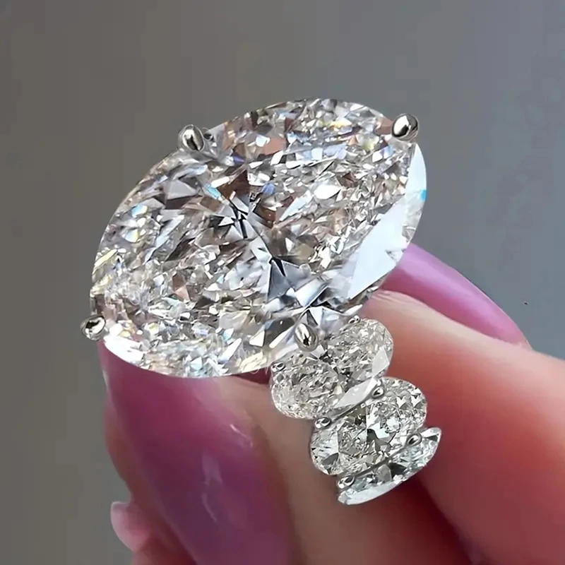Huitan Wunderschöne Damen-Eheringe mit ovalem Zirkonia, elegantes Accessoire für Verlobung, Jahrestag, Party, Damenschmuck, Modeschmuck