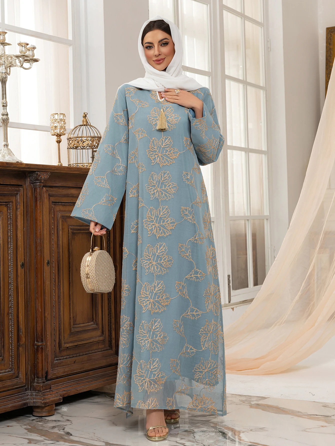 Islamic Women's Light Blue Abaya with Golden Leaf Patterns Collar Tassel Detail Ideal for Ramadan Middle East Religious Gather