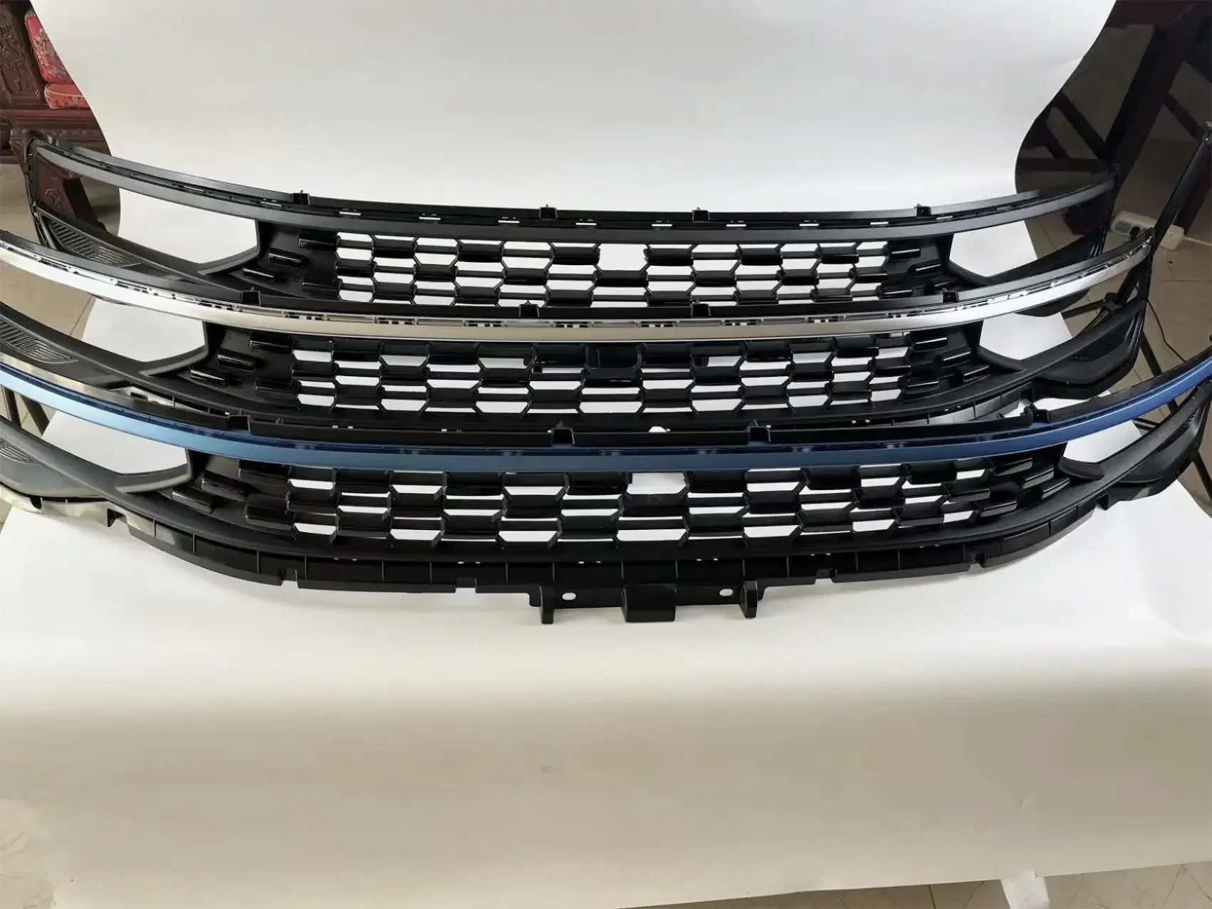 01 Conjunto de malha intermediária da grade superior do para-choque dianteiro 21