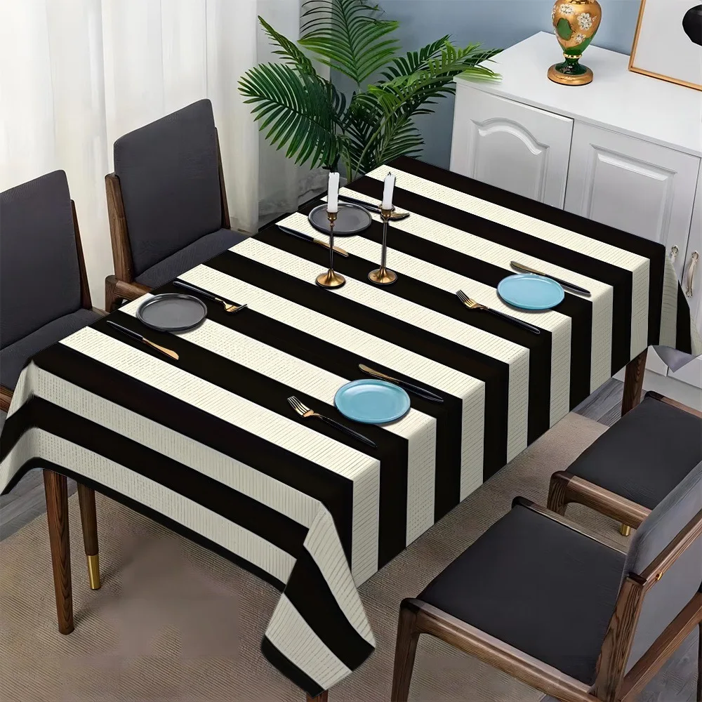 One black and white striped simple tablecloth, rectangular and made of durable polyester fabric.