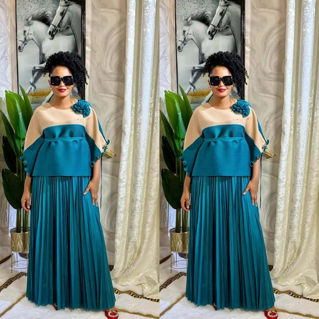 

Miyaki Miyake pleated African fashion loose bat sleeve color matching irregular two-piece women's suit