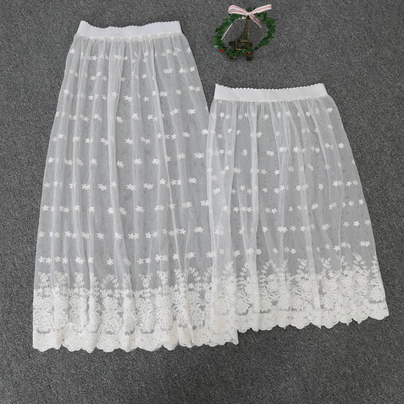 

Korean Style Cute Transparent White Lace Skirt Women Autumn Out Wear Sheer Tulle Skirt Hollow Out Straight Midi Long Skirt