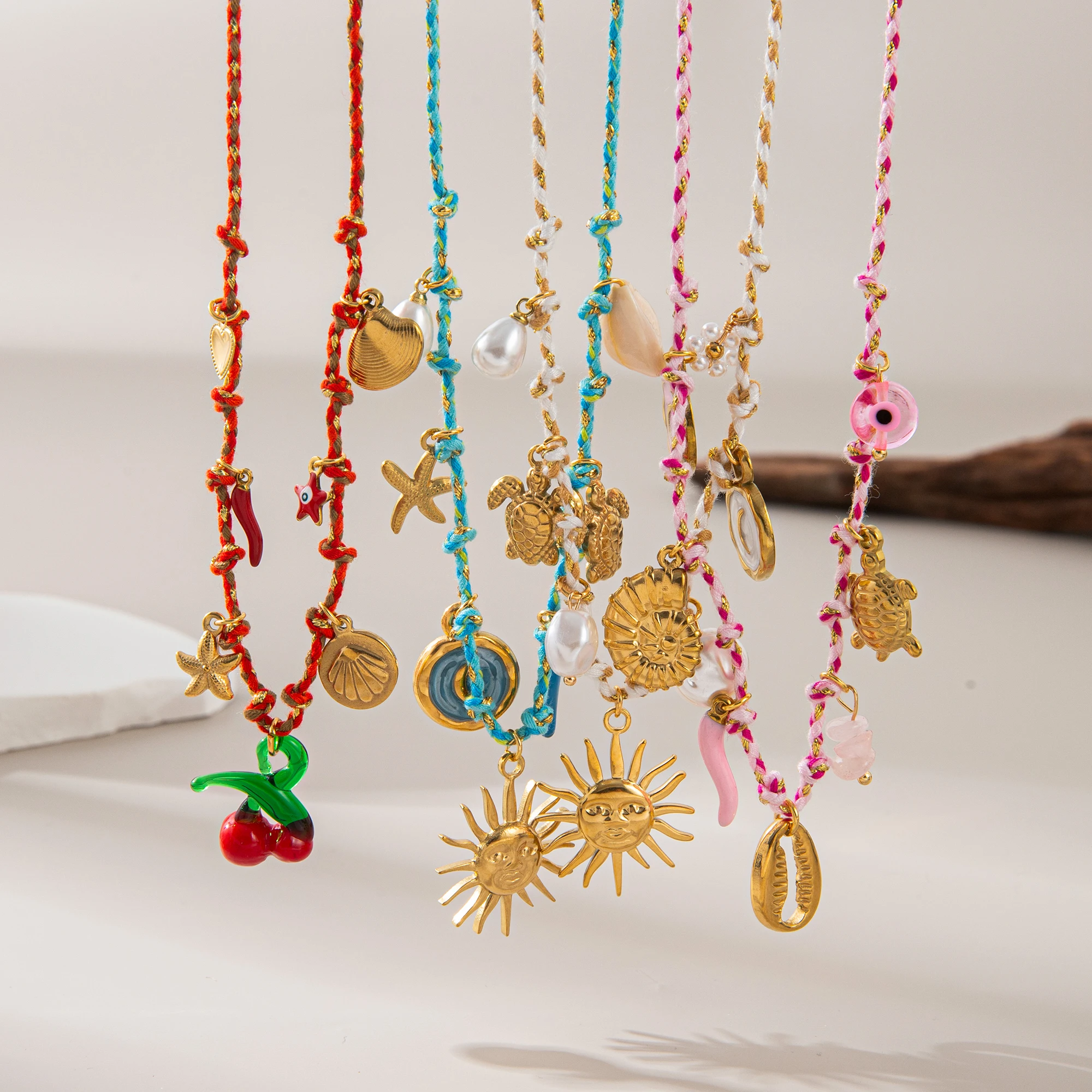 

Personalized DIY knotting rope chain, elephant lotus feather pendant necklace, stainless steel gold-plated color preservation