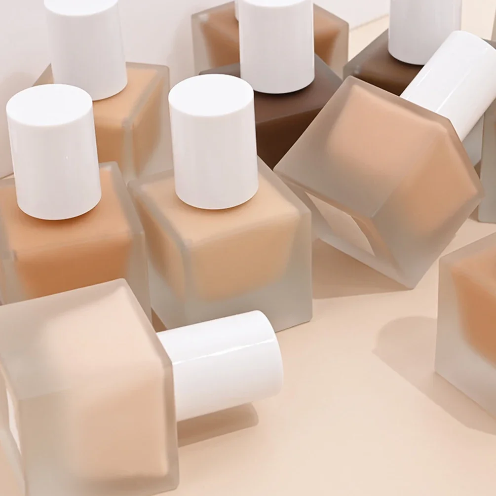 Etichetta privata Fondotinta liquido a 100 colori Logo personalizzato Isolare il controllo dell'olio Lunga durata Facile da indossare Trucco impermeabile Commercio all'ingrosso