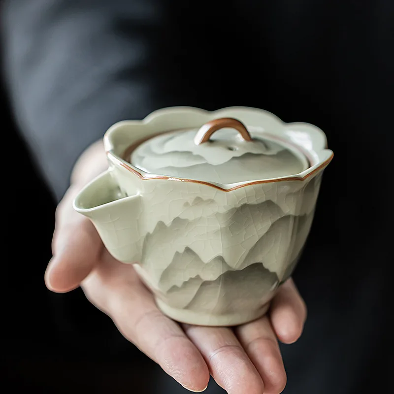 

Chinese hand-held pot Ru Kiln ceramic teapot kung fu tea set can be used to support the family with a hand-made single pot gift