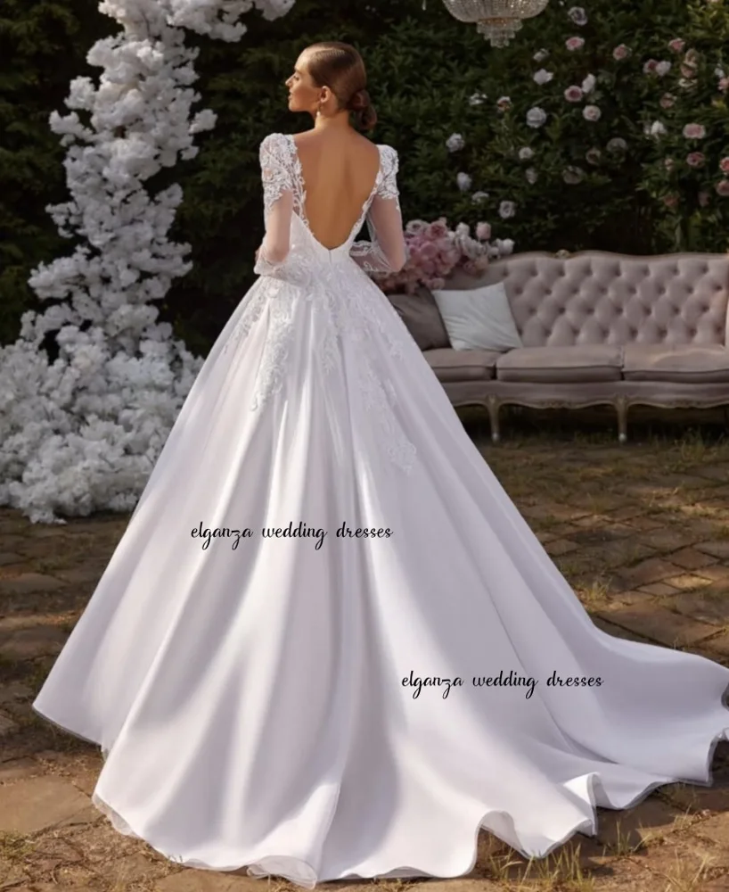 فستان زفاف من الساتان مخصص بأكمام طويلة ورقبة سكوب سويب تراين أزرار خلفية فستان زفاف على شكل حرف A للعروس فيستدو دي نوفيا