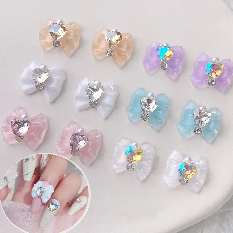 

Heart Rhinestone Nail Bow Charms 10pcs Ice Transparent Crystal Bowtie Jewelry 14*13mm Love Diamond Resin Ribbon Gems for Nails