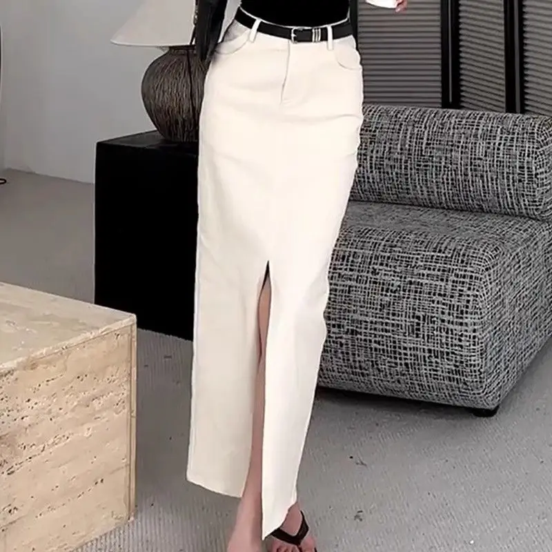 

beige split straight denim skirt women's early spring new A-shaped high waist and thin medium and long hip skirt tide