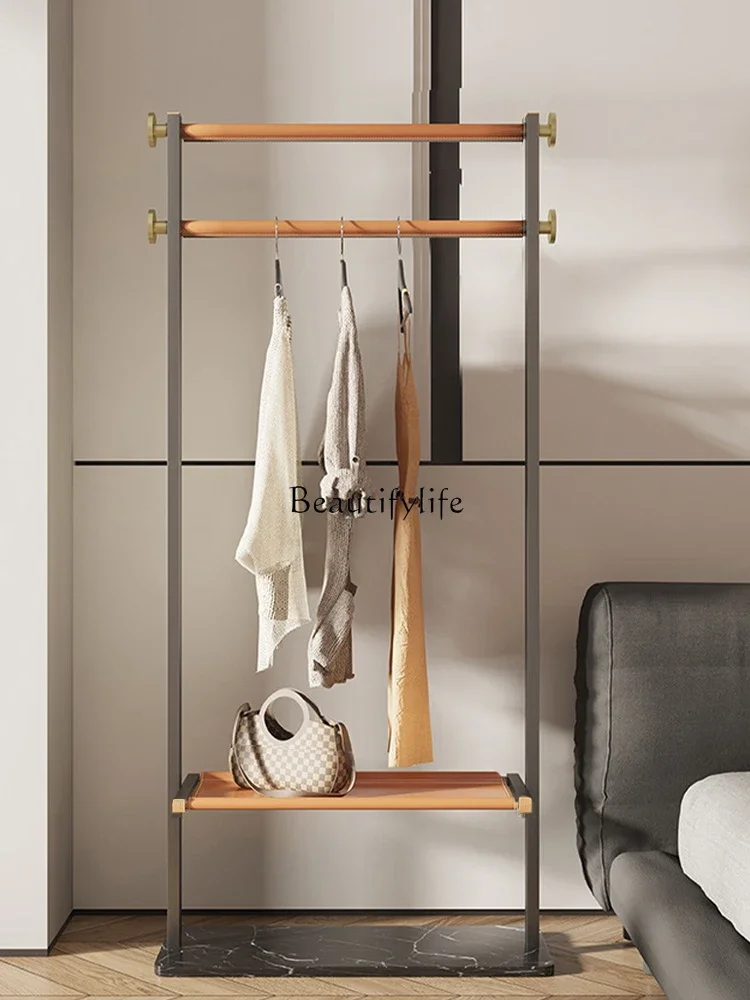 

Italian saddle leather floor-to-ceiling household hanger stainless steel hotel bedroom design rack