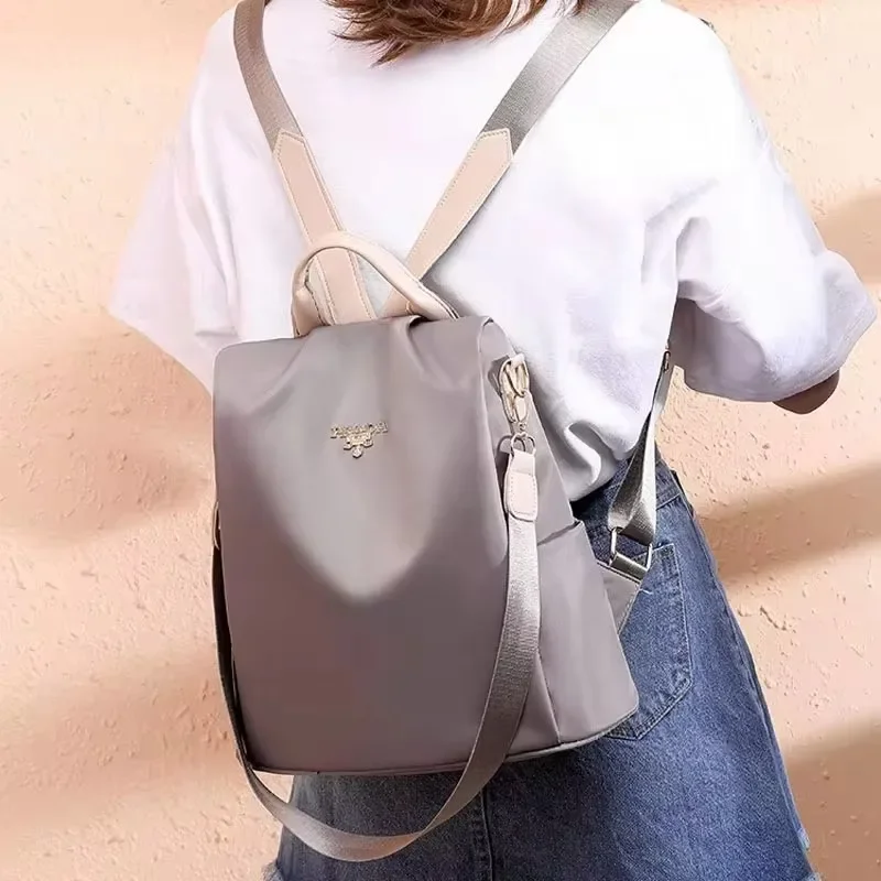 2024 Fashion Oxford Cloth Backpack School Bag Casual Travel Bag Back Opening Anti-Theft for Men and Women Travelling