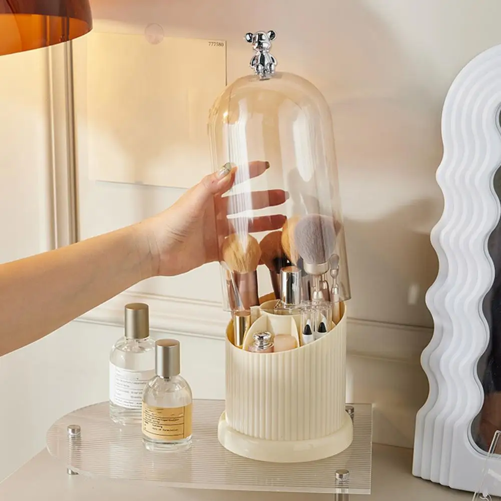 

Covered makeup brush holder features compartments to allow you to easily organize your makeup brushes.