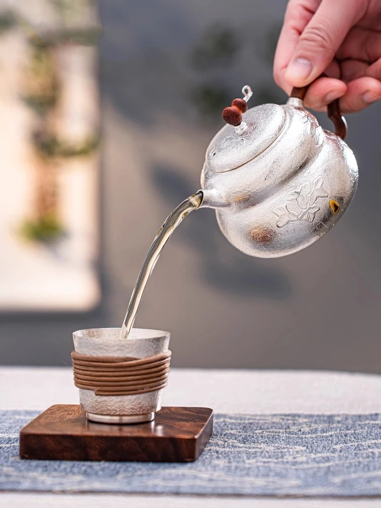 

Handmade Pure Silver 999 Tea Making Pot Inlaid with Gourd Insulation Traditional Craft Silver Pot for Brewing Tea