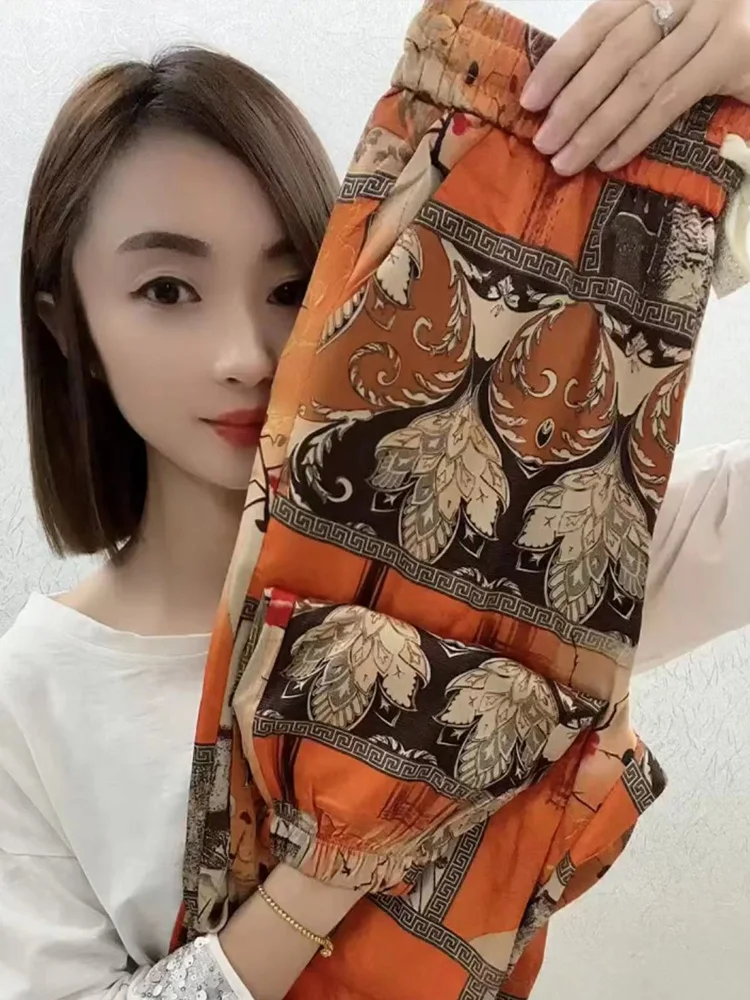 

Летние модные брюки из ледяного шелка с цветочным принтом, женские повседневные тонкие пляжные брюки-харлан, свободного кроя, легкие, с естественной талией, из смесового хлопка