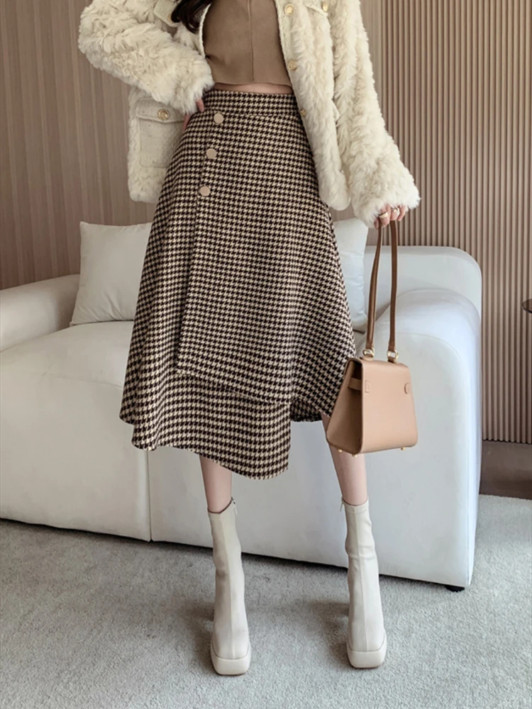 

Irregular tweed plaid high-waisted half-body skirt fall and winter new Korean version of the loose fashion temperament leisure