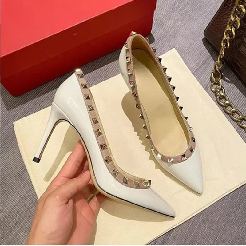 

2025 New European and American Women's Rivet Patent Leather High Heels Pointed Shallow Mouth Shoes