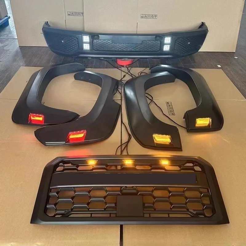 Car Front bumper Body kit for Mitsubishi TRITON L200 2024 Modified Grill with Light Wheel Eyebrow Fender with lamp