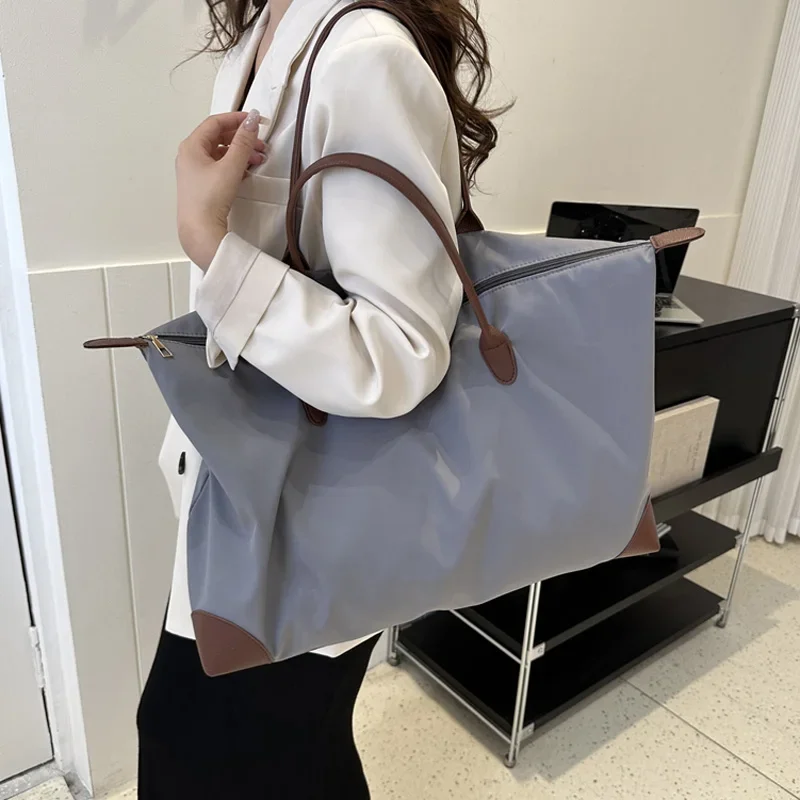 

Foufurieux Autumn Brand Travel Bags Women High Quality Nylon Handbag Weekend Travel Bag Large Capacity Waterproof Luggage Bags