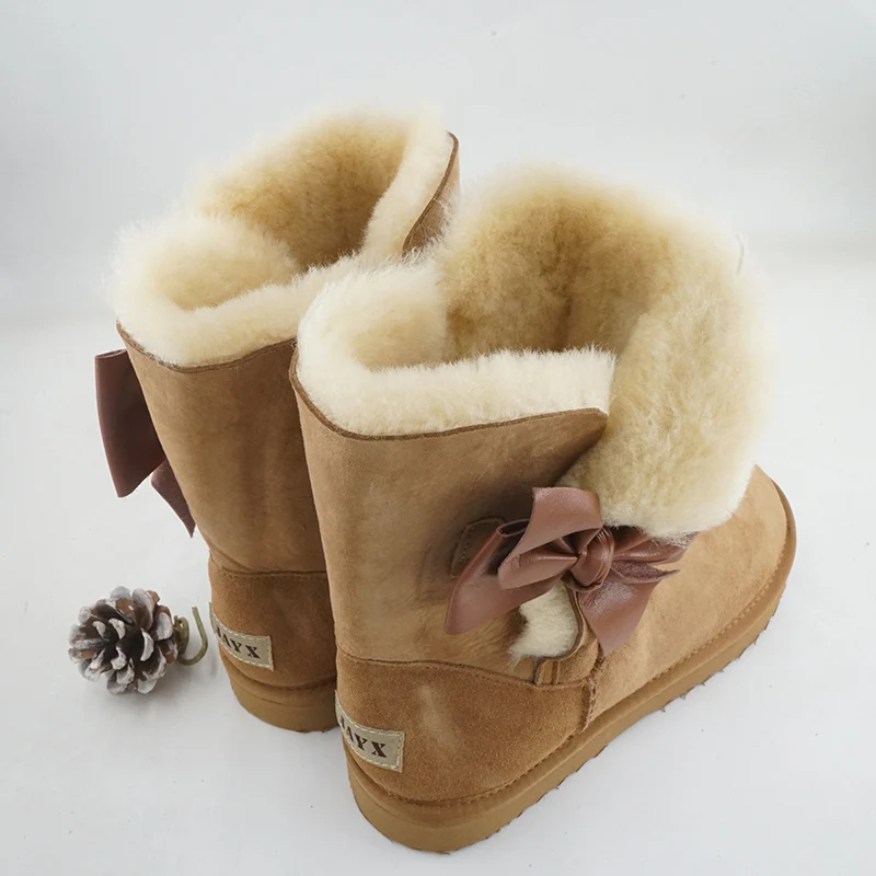 Moda laço botas de neve de pele natural novos sapatos femininos pele de carneiro genuína pele real 100% lã inverno meados de bezerro botas de neve