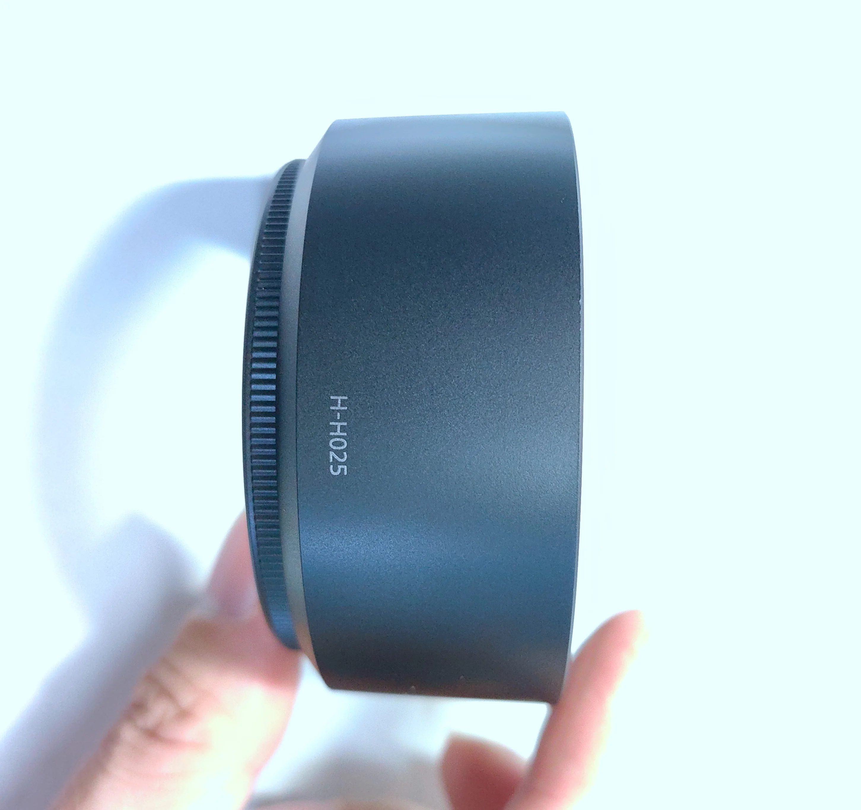 New original For Panasonic 25MM lens H-H025 F1.7 front cover, light-blocking hood, sunshade, black