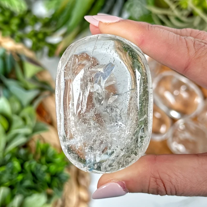A Rare Lemurian Quartz Palm Stone - A Clear Oval Shape with Natural Crystal Texture, Suitable for Home and Office Decoration