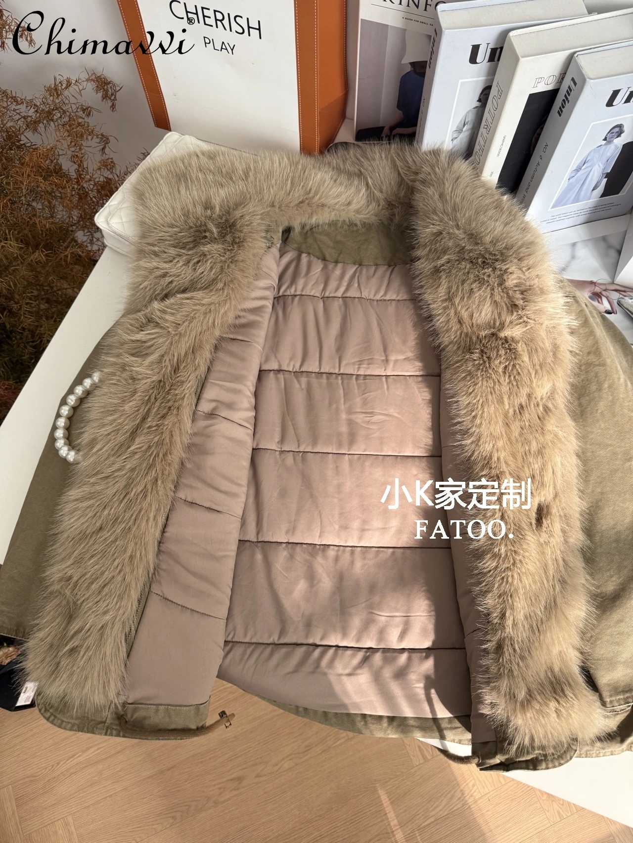 2025 Winter Nieuwe Zachte Pluizige Grote Bontkraag Trekkoord Parka Halflange Warme Verdikte Jas Casual Werkkleding Katoenen Jas Vrouwen