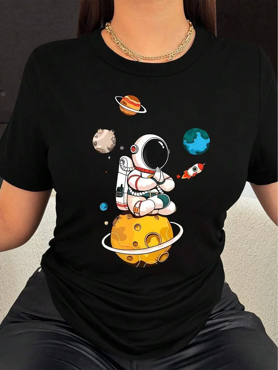 

Plus - Size Trendy “Astronaut in Space” Graphic Tee, Black Short - Sleeve