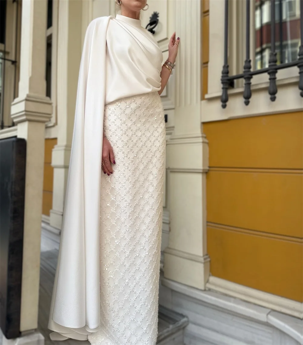 فستان كاثي مخصص لامع أبيض للحفلات الراقصة الرسمية برقبة رسن فيستدوس دي نويفا مع ذيل بطول الأرض فساتين سهرة 2025