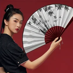 An elegant Chinese silk folding fan - waterproof, tear resistant, portable and lightweight, designed with fabric shade material