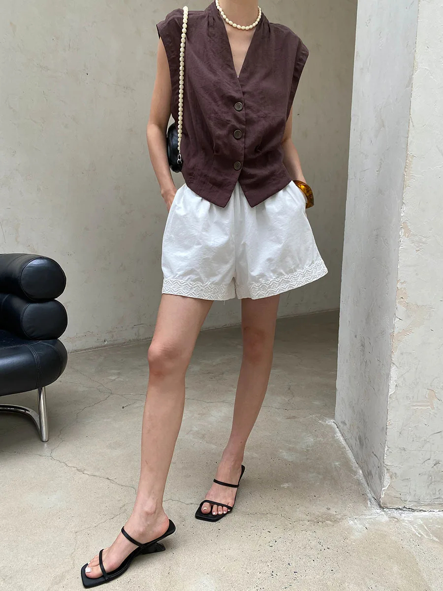 Sommerliche Damen-Shorts in unifarbenem Design mit elastischem Bund, besticktem Patchwork, lockerer Passform und weitem Bein. – Detail 14