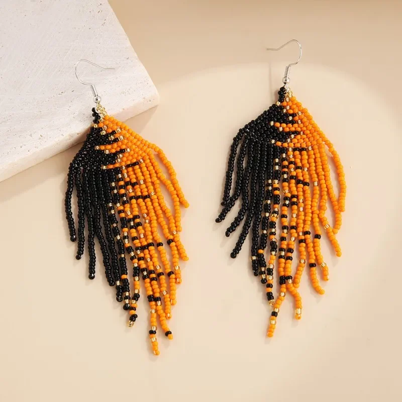 ZGMXR Rice bead earrings Irregularity contrast Originality Design Hand knitting Bohemia Fashion  Alloy Tassel Beaded earrings