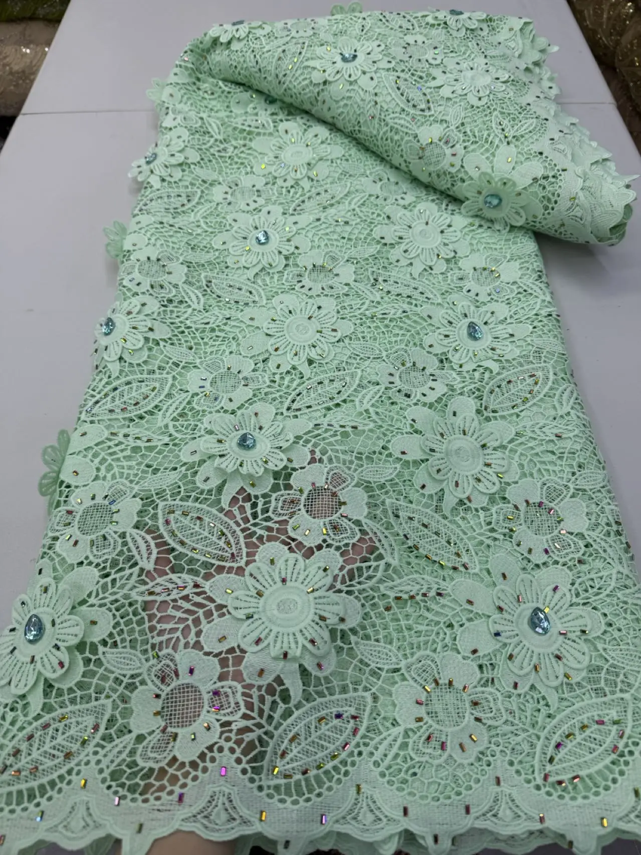 

Latest Cord Guipure Stones Lace Fabric Crystals African Lace Fabric 2026 High Quality Nigerian Water Soluble Material for Dress