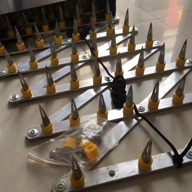 نظام شريط ستينغر سبايك اليدوي المعدني المحمول، أجهزة انكماش قاتل الإطارات، كتلة الطريق #1