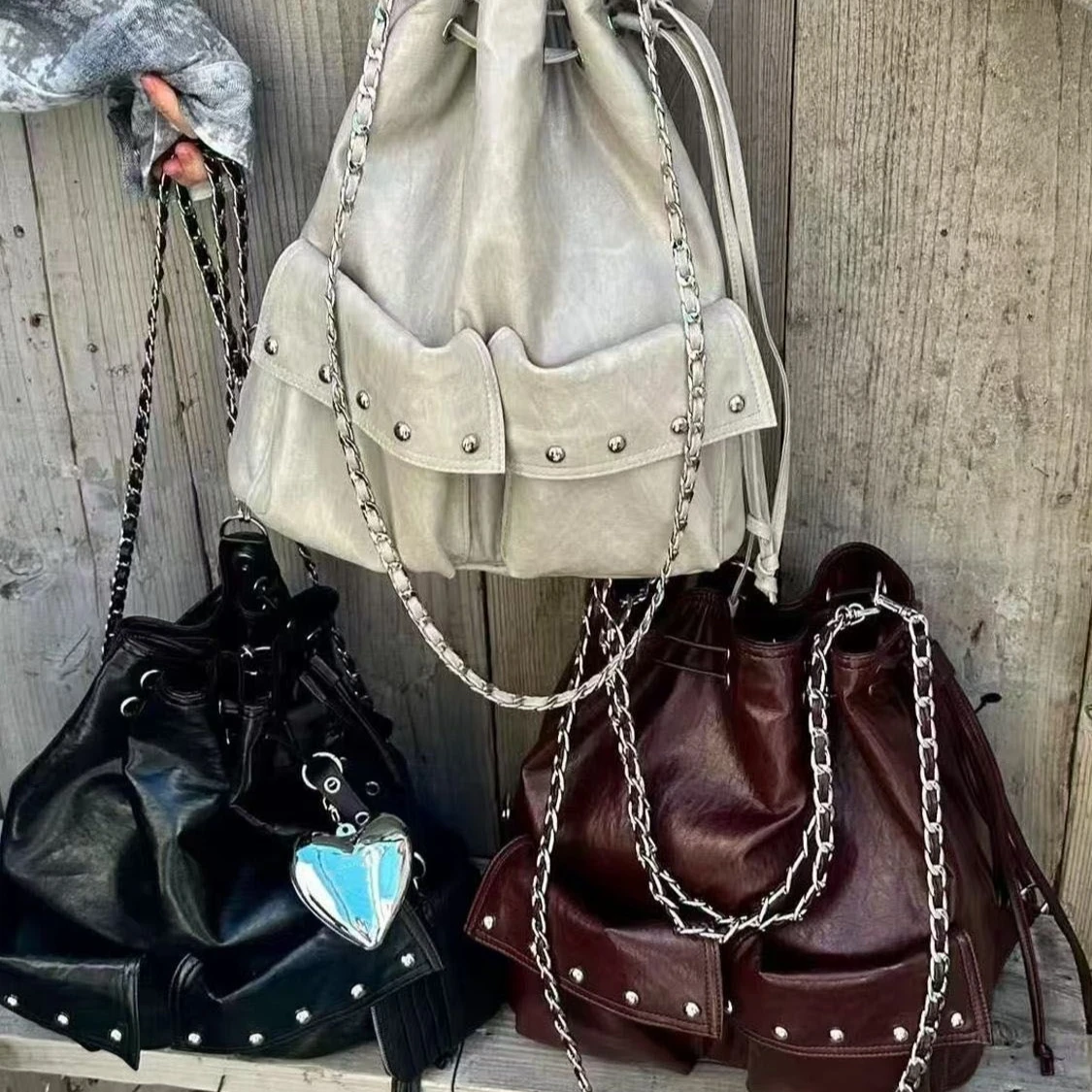 Fashionable Korean Niche PU Leather Rivet Drawstring Large Capacity Backpack Shoulder Bag Woman Bag Storage Bags School Bags