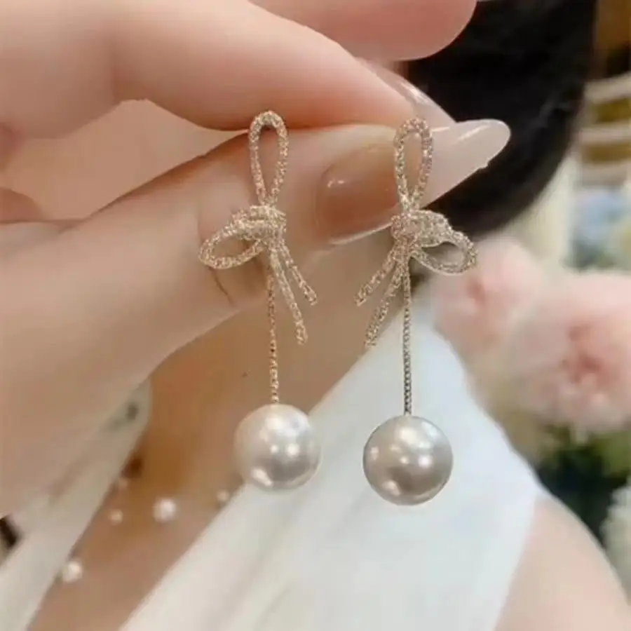 1 pair of bow tassel imitation pearl earrings with a niche design, delicate and cute shape, suitable for women\'s daily wear