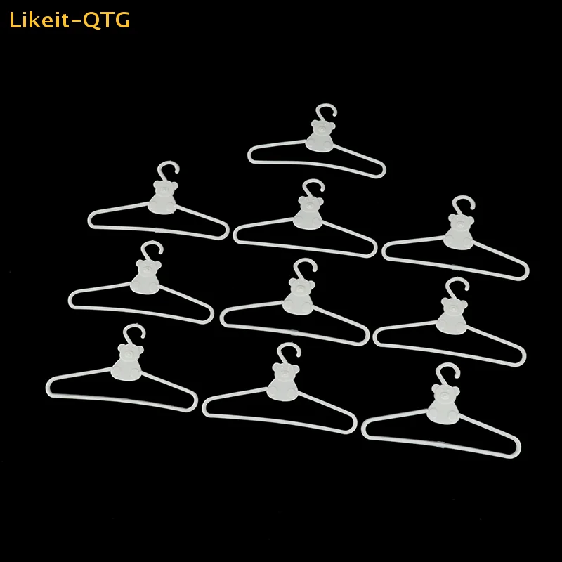 

NEW 10pcs mini Hangers white coat Dress doll Plastic Clip hangers For Doll Wardrobe