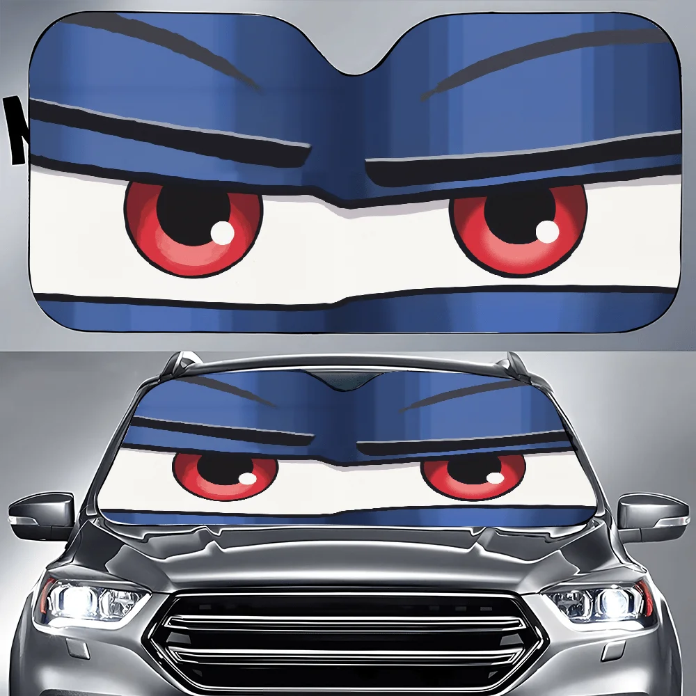 A Detailed View Of A Cartoon Figure Featuring Red Eyes, Designed For Car, Including A Front Window Cover And Decorative Elements