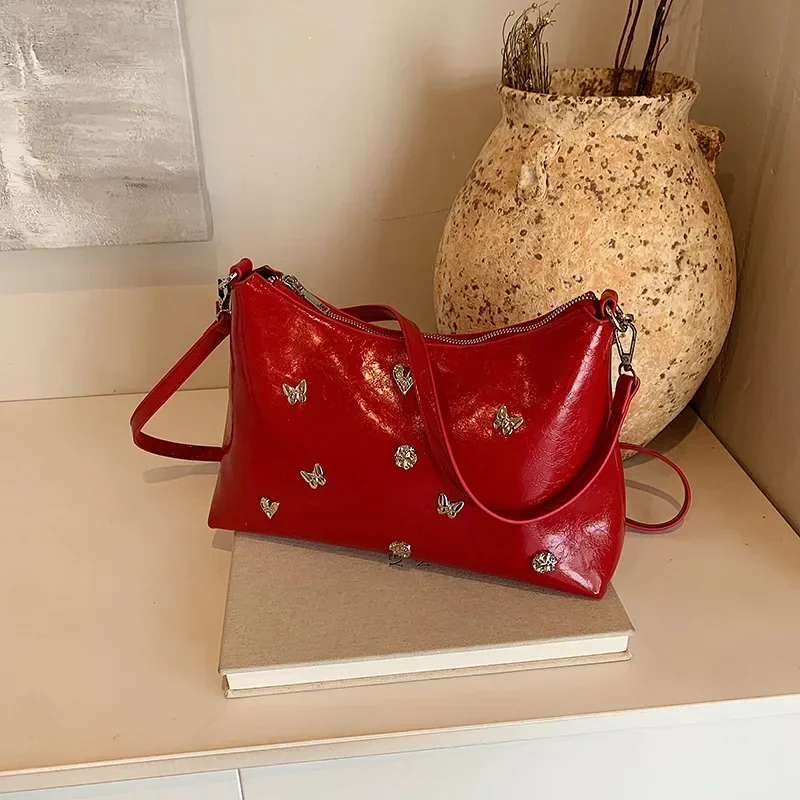 

2025 Women's Niche Punk-style Butterfly Handbag - Trendy, High-quality, Ideal for Commuting, with Underarm and Crossbody Options