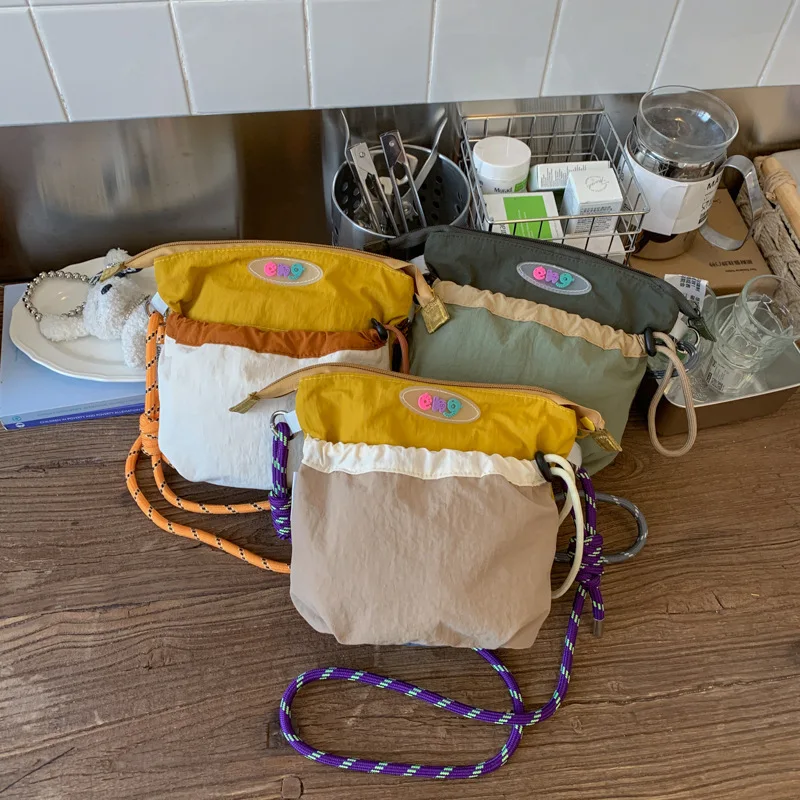 Nylon light outdoor sports cross body bag color draw rope bundle mouth shoulder bag small square bag
